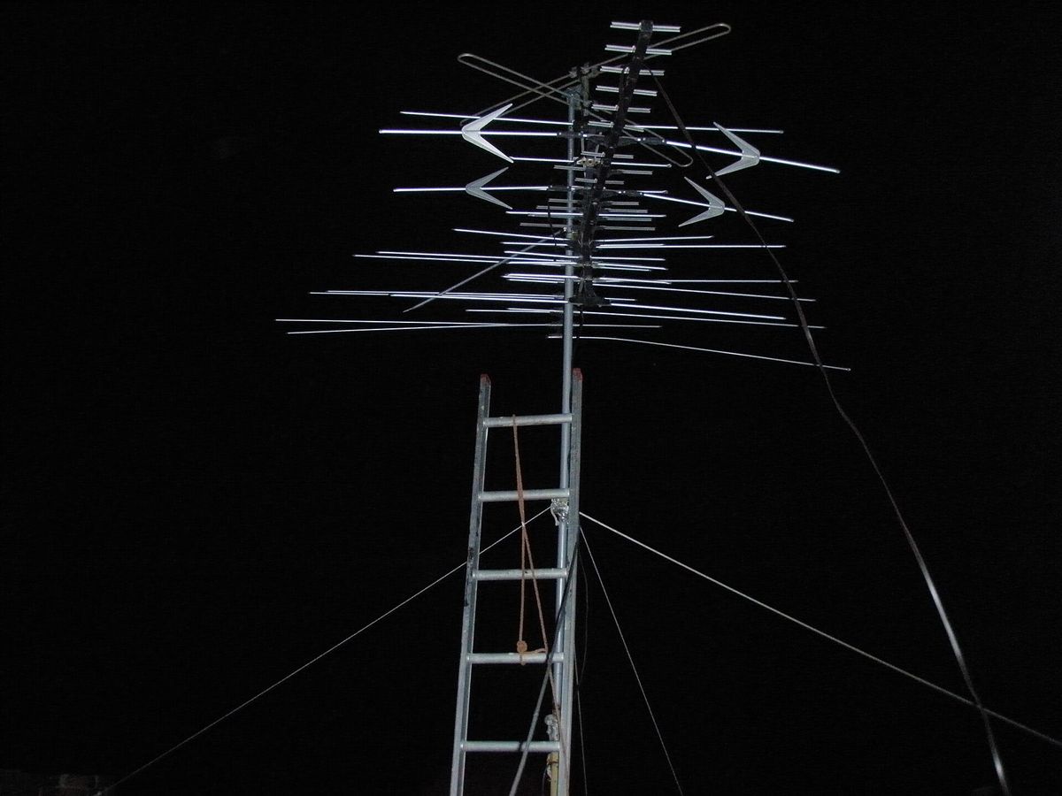 A large rooftop television antenna for terrestrial television reception. This is probably a Winegard HD-7084P VHF/UHF which has 68 elements 